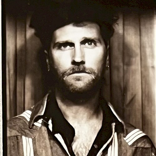 Anderson Knight Koenig performing acoustic folk and blues music during Beats & Bites Brunch at Riverhouse Lodge Bend Oregon.