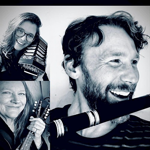 Family trio Dingle All The Way performing Irish traditional music with accordion, guitar and flute at Currents at Riverhouse October 18 in Bend, Oregon