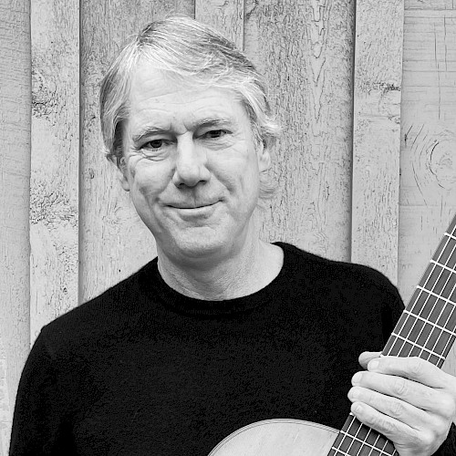 James Townsend performing acoustic folk music during Beats & Bites Brunch at Currents Restaurant Bend Oregon