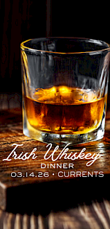 Glass of Irish whiskey on a wooden tray promoting Irish Whiskey Dinner at Currents Restaurant & Lounge, Riverhouse Lodge Bend Oregon, with curated tastings and chef-paired menu.
