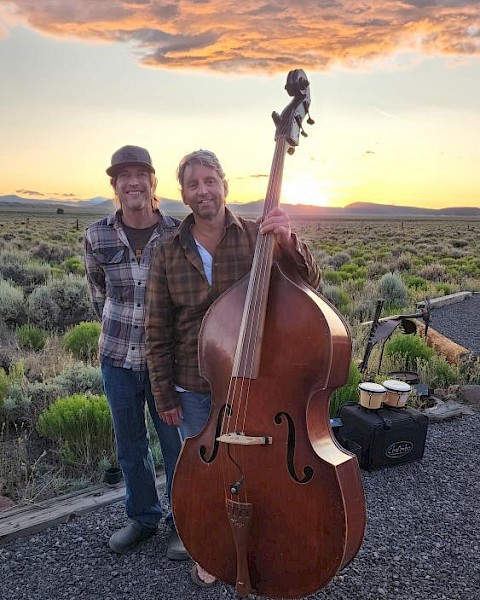 StringBenders bluegrass duo performing upright bass and guitar at Live Music Fridays Riverhouse Lodge Bend Oregon.