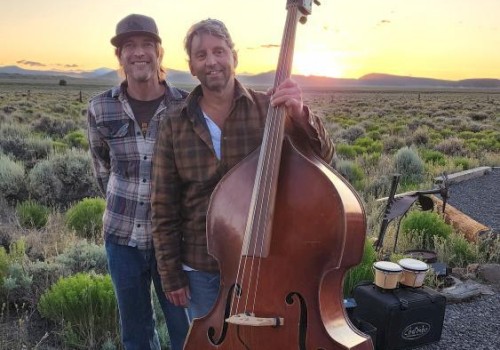 StringBenders bluegrass duo performing upright bass and guitar at Live Music Fridays Riverhouse Lodge Bend Oregon.