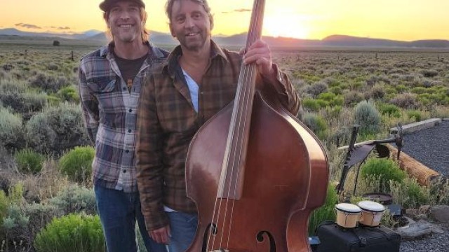 StringBenders bluegrass duo performing upright bass and guitar at Live Music Fridays Riverhouse Lodge Bend Oregon.