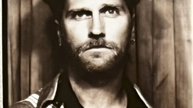 Anderson Knight Koenig performing acoustic folk and blues music during Beats & Bites Brunch at Riverhouse Lodge Bend Oregon.