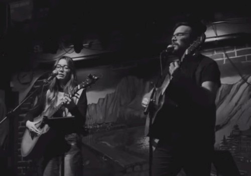 Acoustic duo Mason James and Samantha Hart performing live music during Mother’s Day brunch at Currents Restaurant Riverhouse Lodge Bend Oregon.