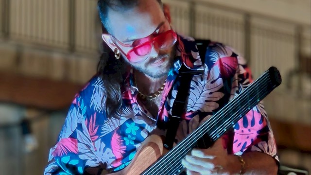 Jazz guitarist performing instrumental brunch music with Smile Aisle during Beats and Bites brunch at Riverhouse Lodge Bend Oregon.