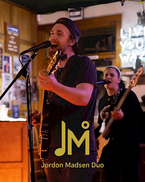 Jordan Madsen Duo performing live music at Currents Restaurant at Riverhouse Lodge in Bend Oregon with guitar and vocals