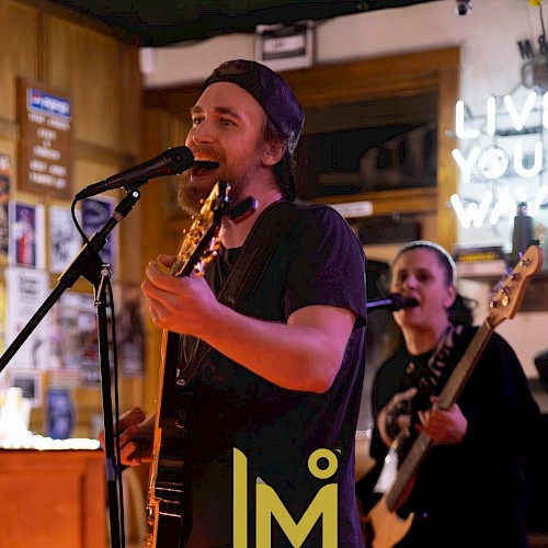 Jordan Madsen Duo performing live music at Currents Restaurant at Riverhouse Lodge in Bend Oregon with guitar and vocals