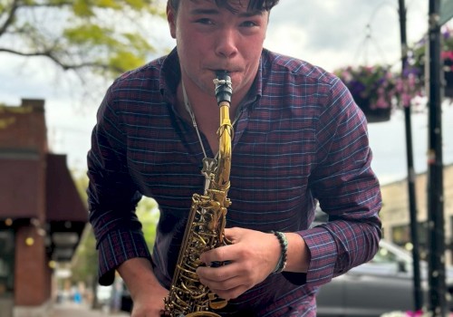Carson Hackbart playing saxophone live during brunch at Currents Riverhouse Lodge Bend Oregon