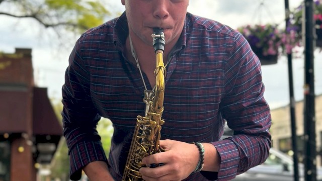 Carson Hackbart playing saxophone live during brunch at Currents Riverhouse Lodge Bend Oregon