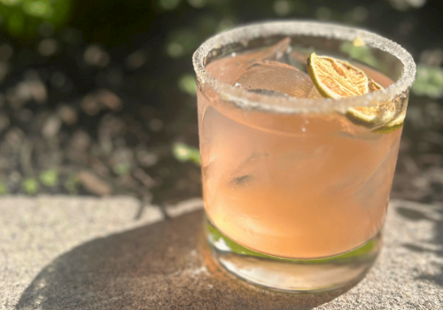 Prickly Pear Margarita with tequila blanco, lime, and black lava salt served at Currents Restaurant & Lounge during Margarita Week at Riverhouse Lodge in Bend, Oregon.