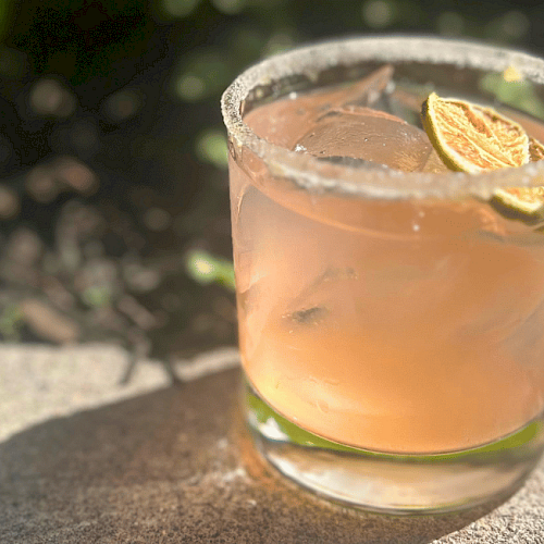 Prickly Pear Margarita with tequila blanco, lime, and black lava salt served at Currents Restaurant & Lounge during Margarita Week at Riverhouse Lodge in Bend, Oregon.