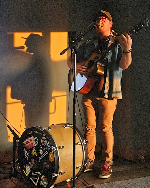 Lucas Treptow performing live Americana and folk music during Live Music Friday at Currents Restaurant at Riverhouse Lodge in Bend, Oregon.