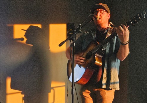 Lucas Treptow performing live Americana and folk music during Live Music Friday at Currents Restaurant at Riverhouse Lodge in Bend, Oregon.