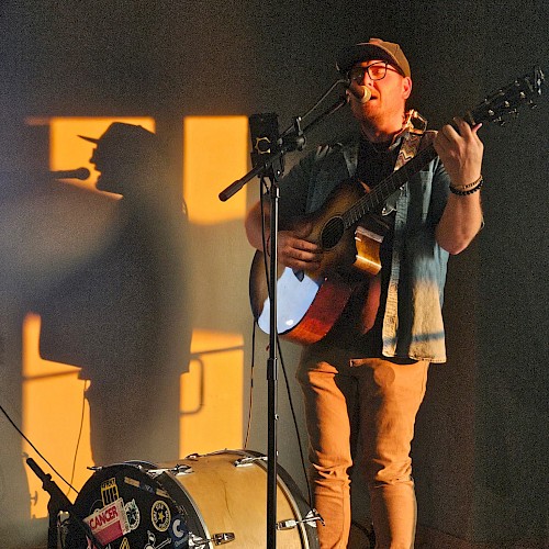 Lucas Treptow performing live Americana and folk music during Live Music Friday at Currents Restaurant at Riverhouse Lodge in Bend, Oregon.