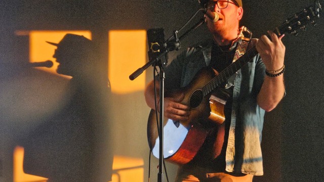 Lucas Treptow performing live Americana and folk music during Live Music Friday at Currents Restaurant at Riverhouse Lodge in Bend, Oregon.
