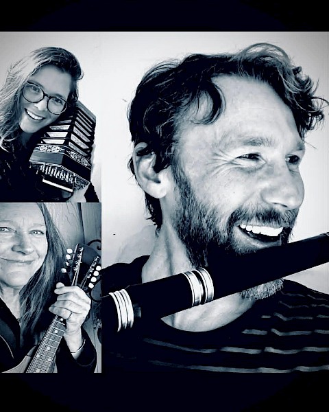 Family trio Dingle All The Way performing Irish traditional music with accordion, guitar and flute at Currents at Riverhouse October 18 in Bend, Oregon
