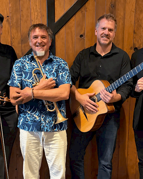 Experience gypsy jazz during Beats & Bites Brunch at Currents. Riverfront dining, brunch cocktails and live music in Bend.
