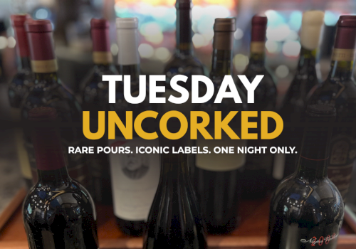 This image features several bottles of wine with a message about 