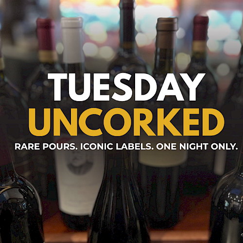 This image features several bottles of wine with a message about 