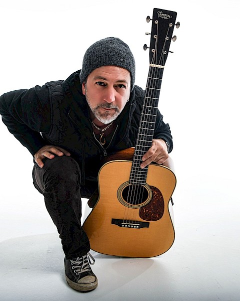 Pete Kartsounes performing live acoustic guitar and singer-songwriter music at Currents Restaurant Bend Oregon