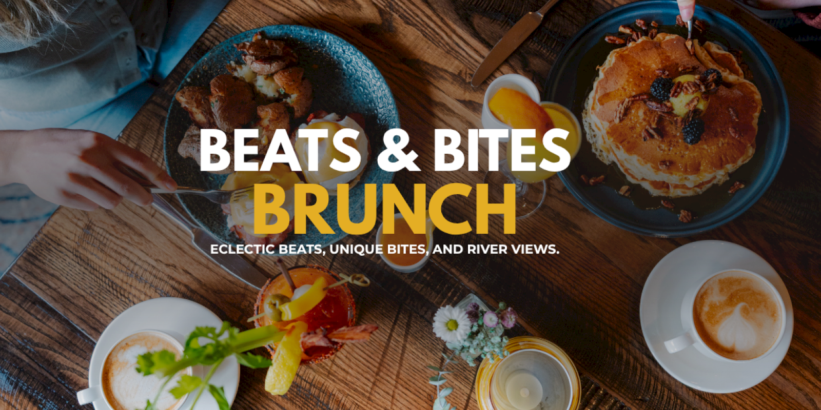 A top-down view of a brunch table with plates of waffles, coffee, and colorful drinks, highlighting a lively and inviting meal scene.