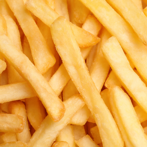 The image shows a close-up view of a pile of golden, crispy French fries.