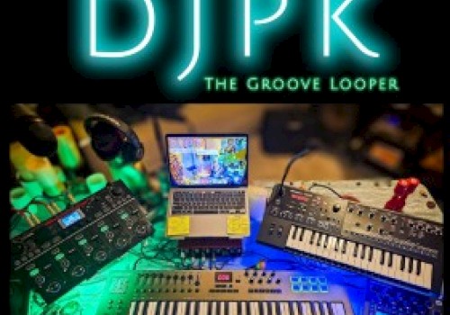 The image features a DJ setup with a laptop, synthesizers, mixers, and microphones, under neon text 