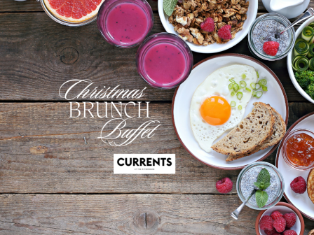 A Christmas brunch spread with smoothies, fried egg, bread, pancakes, fruits, and veggies, accompanied by text reading 