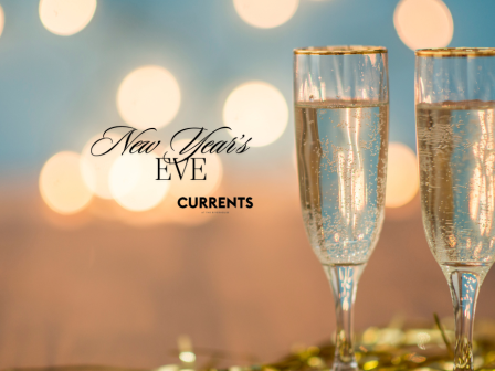 Two champagne glasses with bubbles on a blurred background, featuring the text 