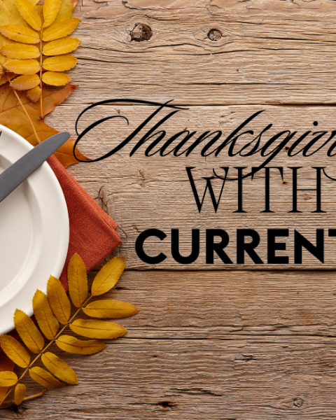 A wooden table with autumn leaves, a plate, and cutlery, alongside text: 