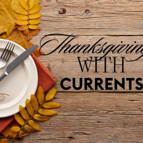 A wooden table with autumn leaves, a plate, and cutlery, alongside text: 