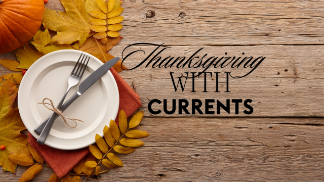 A wooden table with autumn leaves, a plate, and cutlery, alongside text: 