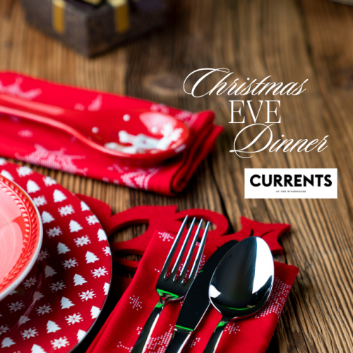 A festive table setting with red plates and cutlery on a wooden table is shown. Text reads 