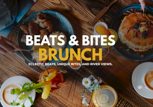 overhead view of breakfast table with food and drinks