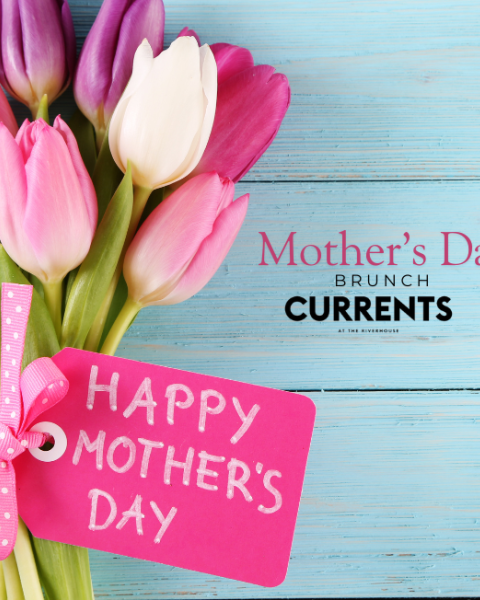 A bouquet of tulips and a pink tag saying 