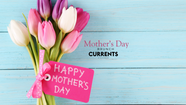 A bouquet of tulips and a pink tag saying 