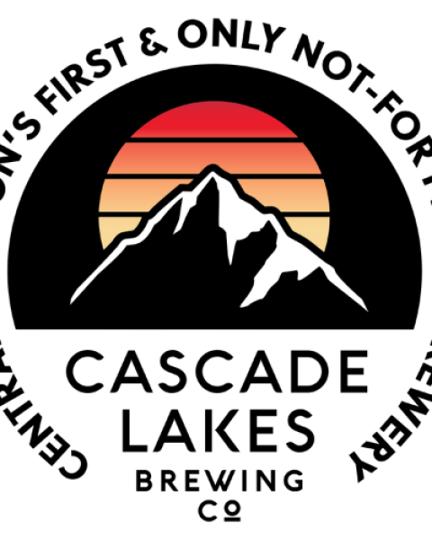 A mountain silhouette is set against a retro-style sunset with horizontal stripes in shades of red, orange, and yellow.