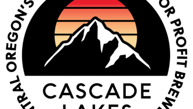 A mountain silhouette is set against a retro-style sunset with horizontal stripes in shades of red, orange, and yellow.
