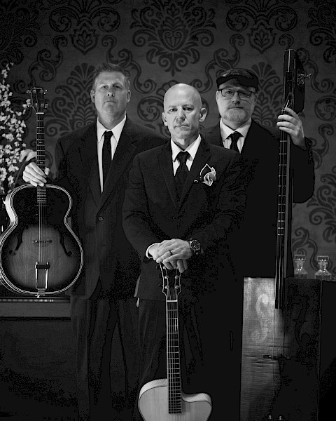 Brandon Campbell Trio live music in Bend Oregon at Currents at the Riverhouse, playing gypsy swing, jazz, and rockabilly on stage, September 19 2025 concert by the Deschutes River