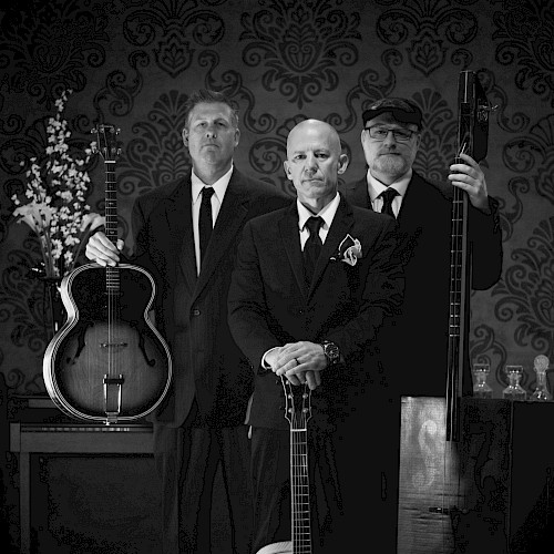 Brandon Campbell Trio live music in Bend Oregon at Currents at the Riverhouse, playing gypsy swing, jazz, and rockabilly on stage, September 19 2025 concert by the Deschutes River
