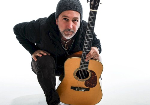 Pete performing live at Currents at Riverhouse Lodge in Bend, Oregon, showcasing award-winning acoustic guitar work and soulful original songwriting.