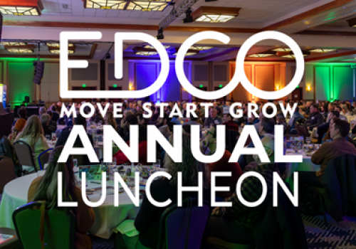 A full ballroom at Riverhouse Lodge set for the EDCO Annual Luncheon, with colorful stage lighting and a large audience—showcasing the lodge as a premier Central Oregon venue for conferences, large meetings, and corporate events.