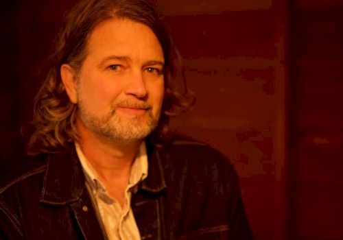 Americana musician John Shipe in a portrait photo, featured live music artist performing at Currents at the Riverhouse in Bend, Oregon.