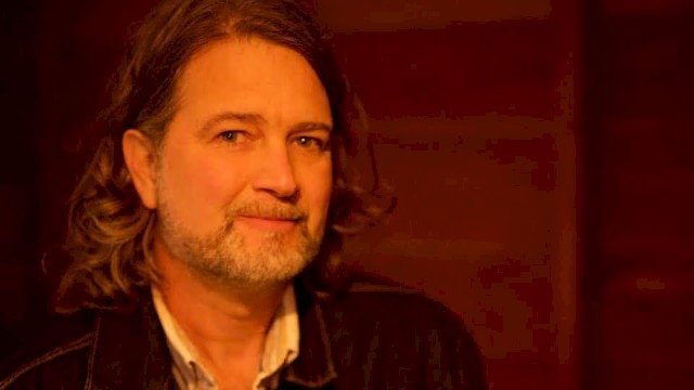 Americana musician John Shipe in a portrait photo, featured live music artist performing at Currents at the Riverhouse in Bend, Oregon.